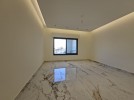 Duplex apartment with garden for sale in  Al Hwaiti, with an area 320m
