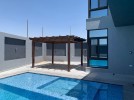 Chalet with pool for sale in Al-Ghor, with a land area of 475m