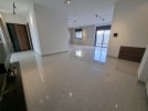 Ground floor with garden for sale in Qaryet AL-Nakheel, area of 240m
