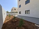 Ground floor with garden for sale in Qaryet AL-Nakheel, area of 240m