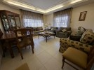 Standalone villa with pool for sale in Abdoun an area of 1160m