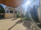 Villa with pool for sale in Umm Al Amad, with a Building area of 1400m