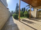 Villa with pool for sale in Umm Al Amad, with a Building area of 1400m