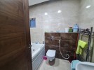 Ground floor apartment with private garage for sale in Umm Al Summaq