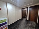 Ground floor apartment with private garage for sale in Umm Al Summaq