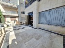 Ground floor apartment with private garage for sale in Umm Al Summaq