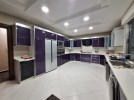 Ground floor apartment with private garage for sale in Umm Al Summaq