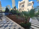 Apartment with a garden for sale in Abdoun 186m