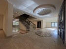 Villa with pool for sale in Qaryet Al Nakheel, building area of 1200m