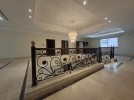 Villa with pool for sale in Qaryet Al Nakheel, building area of 1200m