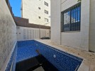 Villa with pool for sale in Qaryet Al Nakheel, building area of 1200m