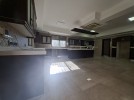 Villa with pool for sale in Qaryet Al Nakheel, building area of 1200m