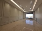 1st floor apartment for sale in Rujm Omaish with a building area 220m