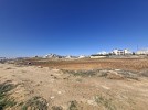 Land for sale in Hai Al Sahaba for building a villa an area of 873m