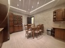 Ground floor apartment with a garden for sale in Dair Ghbar 308m