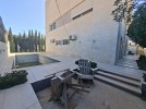 Villa with pool for sale in Umm Rummaneh, built-up area of 990m