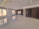 Ground floor apartment with a garden for sale in Abdoun 375m