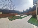 Apartment with a garden for sale in Abdoun 245m