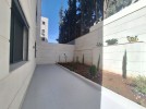 Apartment with a garden for sale in Umm Uthaina 212m