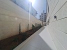 Apartment with a garden for sale in Umm Uthaina 212m