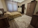 Furnished apartment with garden for sale in Al-Thuhair, area of 262m