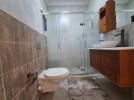 Suspended ground floor apartment for sale in Al-Kursi 250m