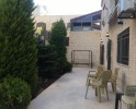 Apartment with a garden for sale in Al-Kursi 195m
