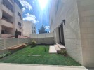 Duplex ground floor apartment with garden for sale in Al-Kursi 230m