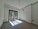 Duplex ground floor apartment with garden for sale in Al-Kursi 210m