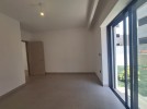 Duplex ground floor apartment with garden for sale in Al-Kursi 210m