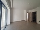 Duplex ground floor apartment with garden for sale in Al-Kursi 210m