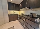Furnished apartment with swimming pool for sale in Al Abdali