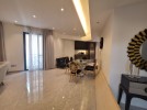 Furnished apartment with swimming pool for sale in Al Abdali