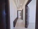 Duplex apartment with a roof and terrace for sale in Umm Uthaina 150m