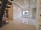 Duplex apartment with a roof and terrace for sale in Umm Uthaina 150m