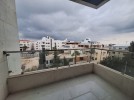 Duplex apartment with a roof and terrace for sale in Umm Uthaina 180m