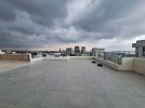 Duplex apartment with a roof and terrace for sale in Umm Uthaina 180m