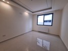 Apartment with private garage for sale in Umm Uthaina 180m