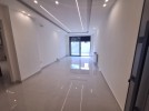 Apartment with private garage for sale in Umm Uthaina 180m