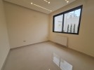 Apartment with private garage for sale in Umm Uthaina 180m