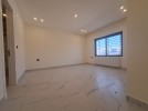 Flat ground floor apartment with a private garage for sale in Khalda