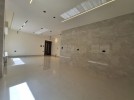 Ground floor apartment with private garage for sale in Umm Al Summaq