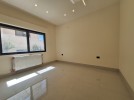 Ground floor apartment with private garage for sale in Umm Al Summaq