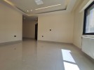 Ground floor apartment with private garage for sale in Umm Al Summaq