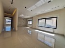 Ground floor apartment with private garage for sale in Umm Al Summaq