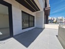 Ground floor apartment with private garage for sale in Umm Al Summaq