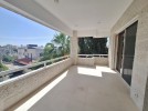 Attached villa with pool for sale in Abdoun, a building area of 600m