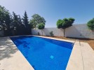 Attached villa with pool for sale in Abdoun, a building area of 600m