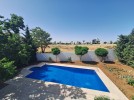 Attached villa with pool for sale in Abdoun, a building area of 600m