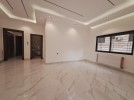 Ground floor apartment with a garden for sale in Dahiet Al Amir Rashid